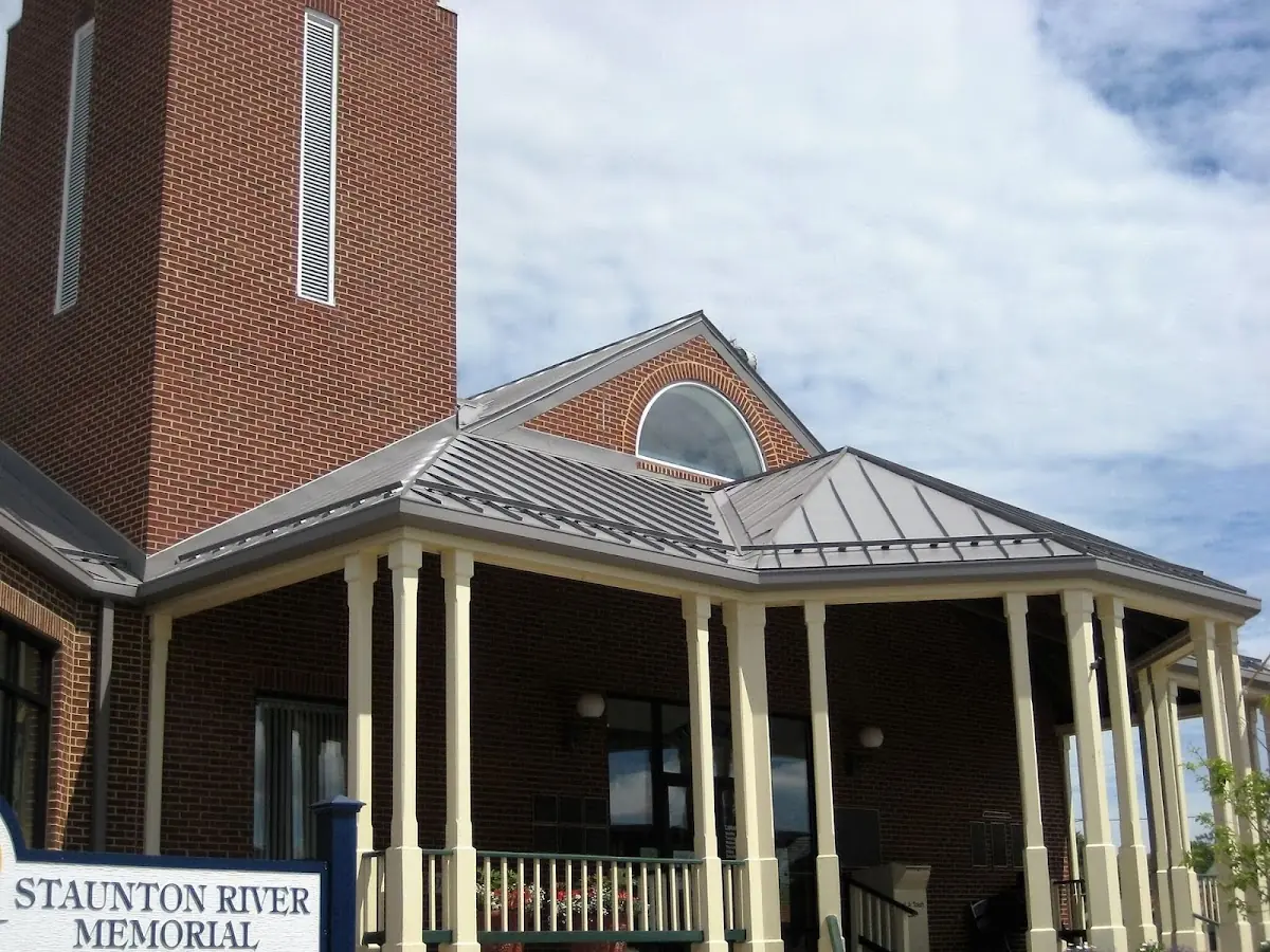 Skilled roofing craftsmen working on a residential roof in LaFayette